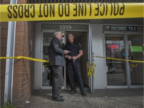 Police were on the scene of a homicide at 3319 Kingsway in Vancouver on April 14, 2014.