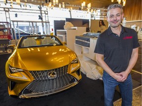 Manager Jason Heard checks out his personal dream car, the LF C2 concept convertible from Lexus at the 2016 Vancouver International Auto Show at the Vancouver Convention Centre Tuesday March 22, 2016.