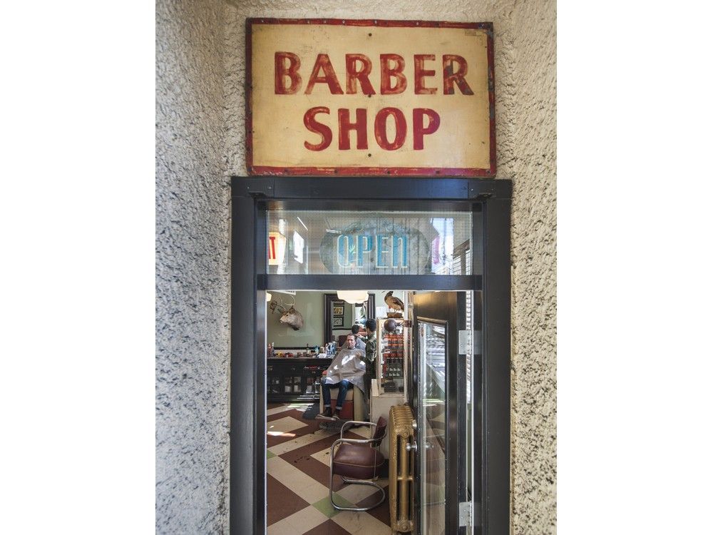 VANCOUVER, BC - MARCH 25, 2016, - Master barber Dustin Fishbook and senior barber Rich Hope of The Belmont Barbershop in Vancouver, BC. March 25, 2016. Fishbook opened The Belmont Barbershop in 2007, just as the popularity of barbering began to surge. (Arlen Redekop / PNG photo) (story by Nick Eagland) [PNG Merlin Archive]