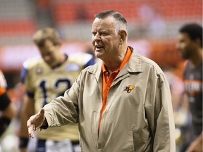 David Braley, shown on the sidelines at a B.C. Lions game in 2014, was admitted to hospital this week.