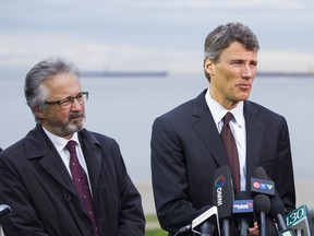 Vancouver City Councillor Geoff Meggs (left) and Mayor Gregor Robertson created a working group in 2014 to explore the idea of declaring Vancouver a "sanctuary city."