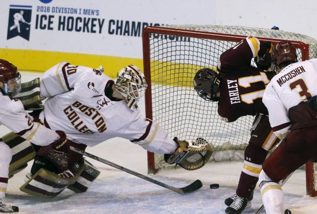 Boston College's Thatcher Demko (30) makes a save with seconds left in the third period of the NCAA men's northeast regional championship hockey game against Minnesota-Duluth in Worcester, Mass., Saturday, March 26, 2016. (AP Photo/Michael Dwyer)