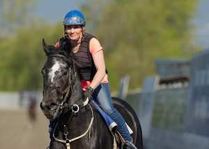 Hastings Racing Club 2's Merlot with trainer Nancy Betts in the saddle for a morning workout. 