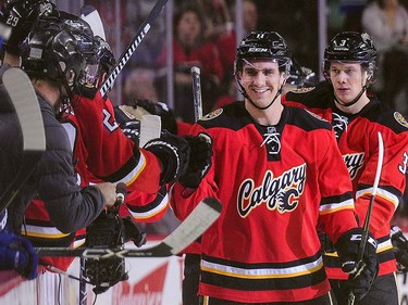 Mikael Backlund #11 of the Calgary Flames celebrates with the bench after scoring against the Vancouver Canucks during an NHL game at Scotiabank Saddledome on April 7, 2016 in Calgary, Alberta, Canada. (Photo by Derek Leung/Getty Images)