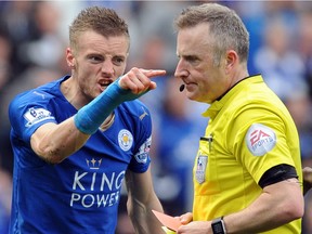 Late-blooming scoring sensation Jamie Vardy gestures to referee Jonathan Moss after being sent off during Leicester City's 2-2 draw against West Ham United.