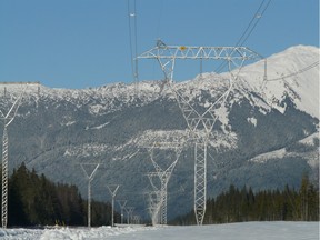 BC Hydro transmission towers in mid-winter, Northwest Transmission Line, northwestern B.C. Taken January 2014. Handout, August 2014, BC Hydro. [PNG Merlin Archive]