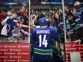 Alexandre Burrows #14 of the Vancouver Canucks walks off the ice after their NHL game against the Edmonton Oilers at Rogers Arena April 9, 2016 in Vancouver, British Columbia, Canada.