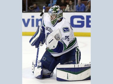 Vancouver Canucks goalie Jacob Markstrom, of Sweden, makes a save against the Anaheim Ducks during the second period of an NHL hockey game in Anaheim, Calif., Friday, April 1, 2016. (AP Photo/Alex Gallardo)