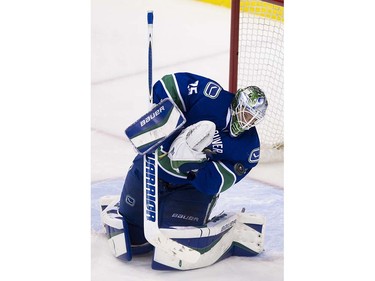 Vancouver Canucks goalie Jacob Markstrom stops a shot from the Edmonton Oilers during the third period of the final regular season NHL hockey game at Rogers Arena, Vancouver April 09 2016. ( Gerry Kahrmann  /  PNG staff photo)  ( For Prov / Sun Sports )  00042613A  [PNG Merlin Archive]
