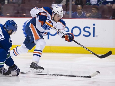 Vancouver Canucks #44 Matt Bartkowski tries to block a shot by Edmonton Oilers #29 Leon Draisaitl during the second period of the final regular season NHL hockey game at Rogers Arena, Vancouver April 09 2016. ( Gerry Kahrmann  /  PNG staff photo)  ( For Prov / Sun Sports )  00042613A  [PNG Merlin Archive]