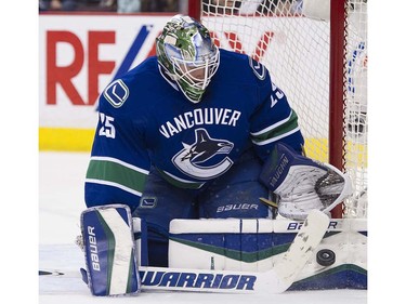Vancouver Canucks goalie Jacob Markstrom stops a shot from the Edmonton Oilers  during the second period of the final regular season NHL hockey game at Rogers Arena, Vancouver April 09 2016. ( Gerry Kahrmann  /  PNG staff photo)  ( For Prov / Sun Sports )  00042613A  [PNG Merlin Archive]