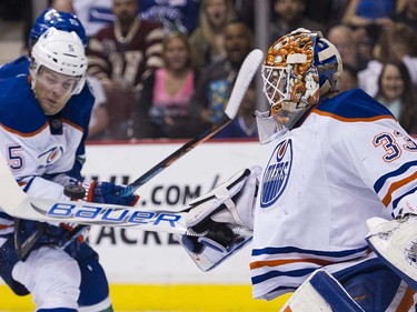 Oilers #5 Mark Fayne keeps Vancouver Canucks #15 Derek Dorsett from the rebound in front of Edmonton Oilers goalie Cam Talbot during the first period of the final regular season NHL hockey game at Rogers Arena, Vancouver April 09 2016. ( Gerry Kahrmann  /  PNG staff photo)  ( For Prov / Sun Sports )  00042613A  [PNG Merlin Archive]