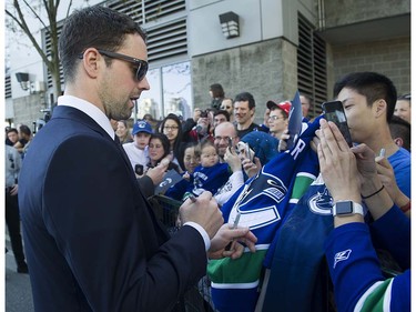 Dan Hamhuis is a fan favourite for his work on and off the ice with the Canucks. (Getty Images).