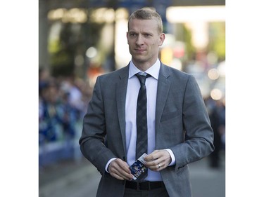Canucks player Jannik Hansen walks to receive his award at  the fan meet on Pat Quinn Way outside Rogers Arena prior to the last game of the regular season, Vancouver April 09 2016. ( Gerry Kahrmann  /  PNG staff photo)  ( For Prov / Sun Sports )  00042648A  [PNG Merlin Archive]