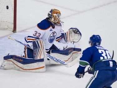 Vancouver Canucks #36 Jannik Hansen scores on Edmonton Oilers goalie Cam Talbot during the third period of the final regular season NHL hockey game at Rogers Arena, Vancouver April 09 2016. ( Gerry Kahrmann  /  PNG staff photo)  ( For Prov / Sun Sports )  00042613A  [PNG Merlin Archive]