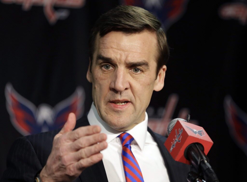 Could George McPhee be hired for a front-office position with the Canucks? 