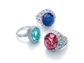 CLOCKWISE: Ring of an oval cut blue sapphire with marquise shaped diamonds; ring of an oval cut pink spinel with two pear shaped blue cuprian elbaite tourmalines and round diamonds; and ring of an oval cut blue cuprian elbaite tourmaline with round diamonds, all from the Tiffany Blue Book 2016, The Art of Transformation.
