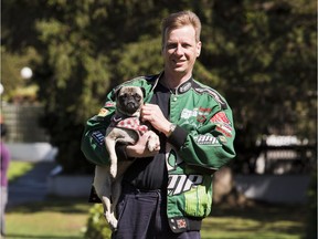 Dale O'Reilly, 44, holding his 3.5-year-old pug, J-Lo, is having a difficult time finding a rental suite that will allow his dog, April 25, 2016. [PNG Merlin Archive]