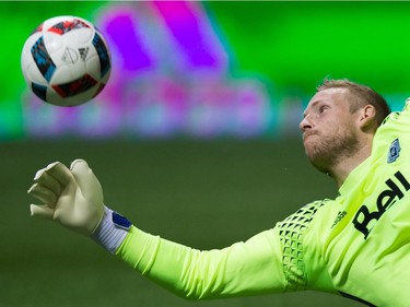 Vancouver Whitecaps goalkeeper David Ousted makes a diving save against FC Dallas during the first half in Vancouver, B.C., on  April 23, 2016.