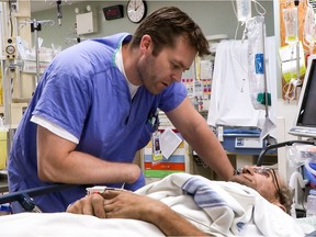 Dr. Campbell takes care of a patient in Season Two of Emergency Room: Life + Death at VGH.