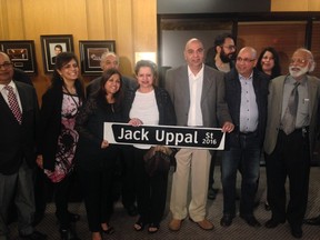 Friends and family members of Jack Uppal with the Vancouver street named in his honour.