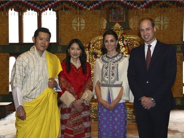 From left to right, Bhutan's King Jigme Khesar Namgyel Wangchuk, Bhutan's Queen, Jetsun Pema, Kate, Duchess of Cambridge and Britain's Prince William pose for a photograph in Thimphu, Bhutan, Thursday, April 14,  (Royal Kingdom of Bhutan via AP)