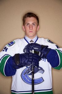 MONTREAL , QC - JUNE 26: Jordan Schroeder poses for a portrait after being selected 22nd overall by the Vancouver Canucks during the first round of the 2009 NHL Entry Draft at the Bell Centre on June 26, 2009 in Montreal, Quebec, Canada. (Photo by Andre Ringuette/NHLI via Getty Images)