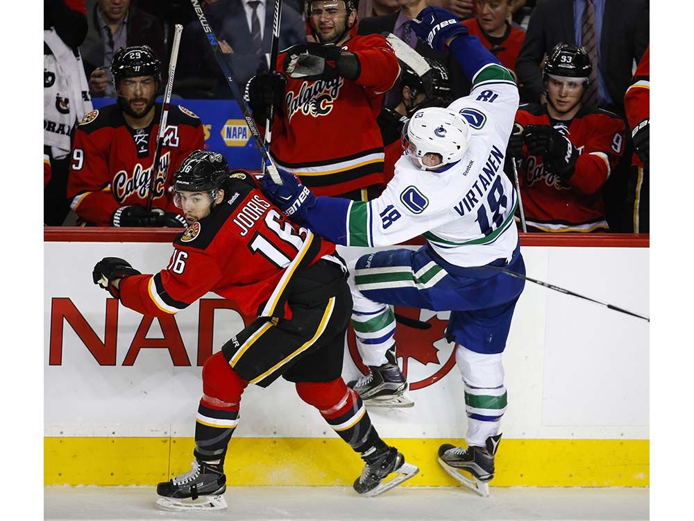 Photos: Canucks Burned By Flames | Vancouver Sun