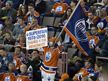 A fan shows his support as he watches the final game at Rexall Place as the Vancouver Canucks play the Edmonton Oilers during second period NHL action in Edmonton, Alta., on Wednesday April 6, 2016. THE CANADIAN PRESS/Jason Franson