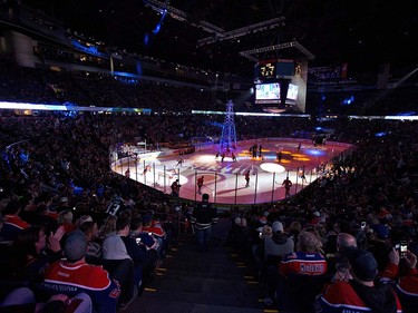 Vancouver Canucks and Edmonton Oilers take the ice before first period NHL action in Edmonton, Alta., on Wednesday April 6, 2016. THE CANADIAN PRESS/Jason Franson