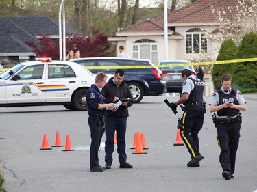 RCMP have locked down the area around the scene which is across from Bear Creek Park in a residential neighbourhood. It is the city's 31st shooting so far this year.  [PNG Merlin Archive]