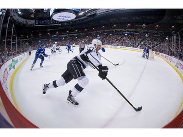 Los Angeles Kings' Jeff Carter skates with the puck during the first period of an NHL hockey game against the Vancouver Canucks in Vancouver, B.C., on Monday April 4, 2016.