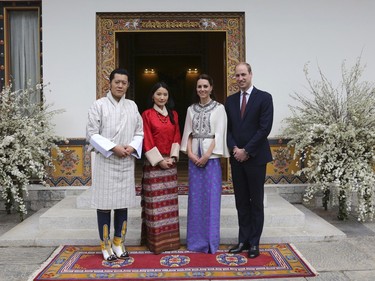 From left to right, Bhutan's King Jigme Khesar Namgyel Wangchuk, Bhutan's Queen, Jetsun Pema, Kate, Duchess of Cambridge and Britain's Prince William pose for a photograph in Thimphu, Bhutan, Thursday, April 14, 2016. The Duke and Duchess of Cambridge are on a weeklong visit to India and Bhutan, their first royal tour in two years.