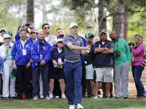 Jordan Spieth watches his shot out of the rough on the 10th hole during a practice round on Wednesday for the Masters golf tournament, which starts Thursday in Augusta, Ga.