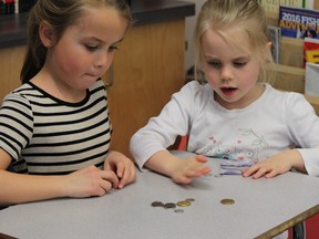 Kids learning financial literacy as part of Talk With Our Kids about Money Day, brought to you by the Canadian Foundation for Economic Education.