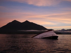The bow of the Leviathan II is seen near Vargas Island two days after the vessel capsized last Oct. 25.