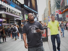 Listening to Jungle-ized in Times Square, New York. The creators of Jungle-ized used Motive.io, a platform created by a Vancouver-based company to create soundscapes of the Amazon jungle in Peru.