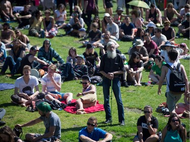 An elderly man stands in the crowd during the annual 4/20 cannabis culture celebration at Sunset Beach in Vancouver, B.C., on Wednesday April 20, 2016.