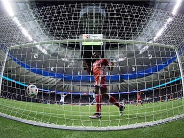FC Dallas' Maynor Figueroa watches the ball bounce in the back of the net after Vancouver Whitecaps' Kekuta Manneh scored during the second half of an MLS soccer game in Vancouver, B.C., on April 23, 2016.