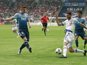 Vancouver Whitecaps right back Fraser Aird (left) had a tough time dealing with the Montreal Impact’s Ignacio Piatti during their MLS season opener on March 6 at B.C. Place Stadium. Things have improved for Aird since then.