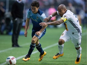 Nicolas Mezquida, left, has brought tenacity to the Whitecaps that doesn't always show on the stat sheet, but definitely makes Vancouver better.