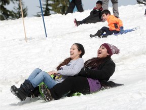 These are some of the 350 refugees who enjoyed a day of winter sports Sunday on Mt. Seymour.