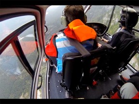 North Shore Rescue took to the skies on Sunday to search for an unprepared hiker near Coliseum Mountain. Video taken from a helmet camera shows the search from a Talon Helicopter high above the North Shore mountains.
