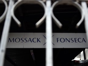 View of a sign outside the building where Panama-based Mossack Fonseca law firm offices are in Panama City, on April 4, 2016. A massive leak -coming from Mossack Fonseca- of 11.5 million tax documents on Sunday exposed the secret offshore dealings of aides to Russian president Vladimir Putin, world leaders and celebrities including Barcelona forward Lionel Messi. An investigation into the documents by more than 100 media groups, described as one of the largest such probes in history, revealed the hidden offshore dealings in the assets of around 140 political figures -- including 12 current or former heads of states.