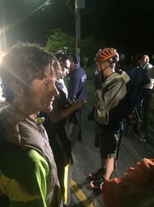 The paraglider, Bruno, talks with police.