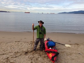 Reporter Larry Pynn prepares to launch his kayak at Third Beach in Stanley Park.