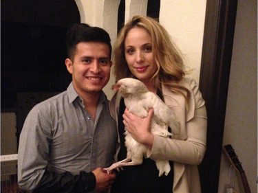 Jockey Mario Gutierrez at home in Pasadena, Calif., with his wife Rebecca Ayarra and their chicken Coco.