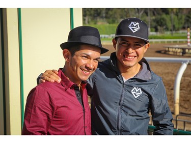 Horse racing jockey Mario Gutierrez (right) with his friend Fernando Perez at the Santa Anita Park racetrack in Arcadia, Calif., on April 16, 2016.