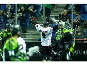Vancouver Stealth's Chris O'Dougherty celebrates his goal on Saskatchewan Rush goalkeeper Aaron Bold during Saturday's game at the Langley Events Centre.