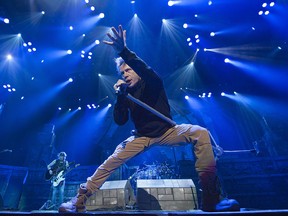 Bruce Dickinson of Iron Maiden sings while performing at Roger Arena in Vancouver, April, 10, 2016.